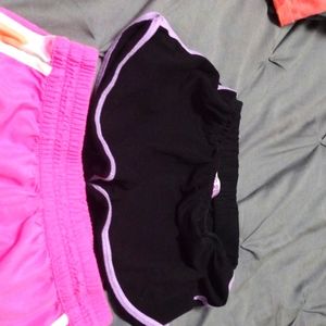 Two pairs of shorts.